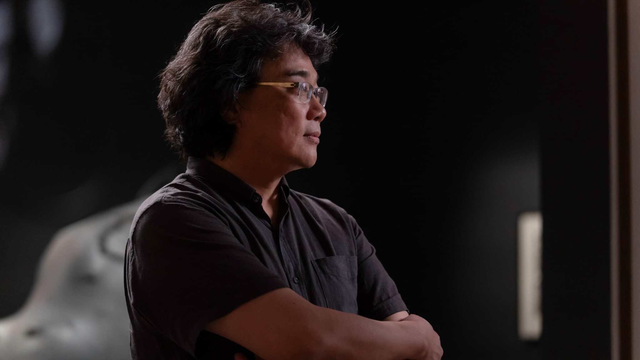 Bong Joon Ho in black shirt inside the Academy Museum.
