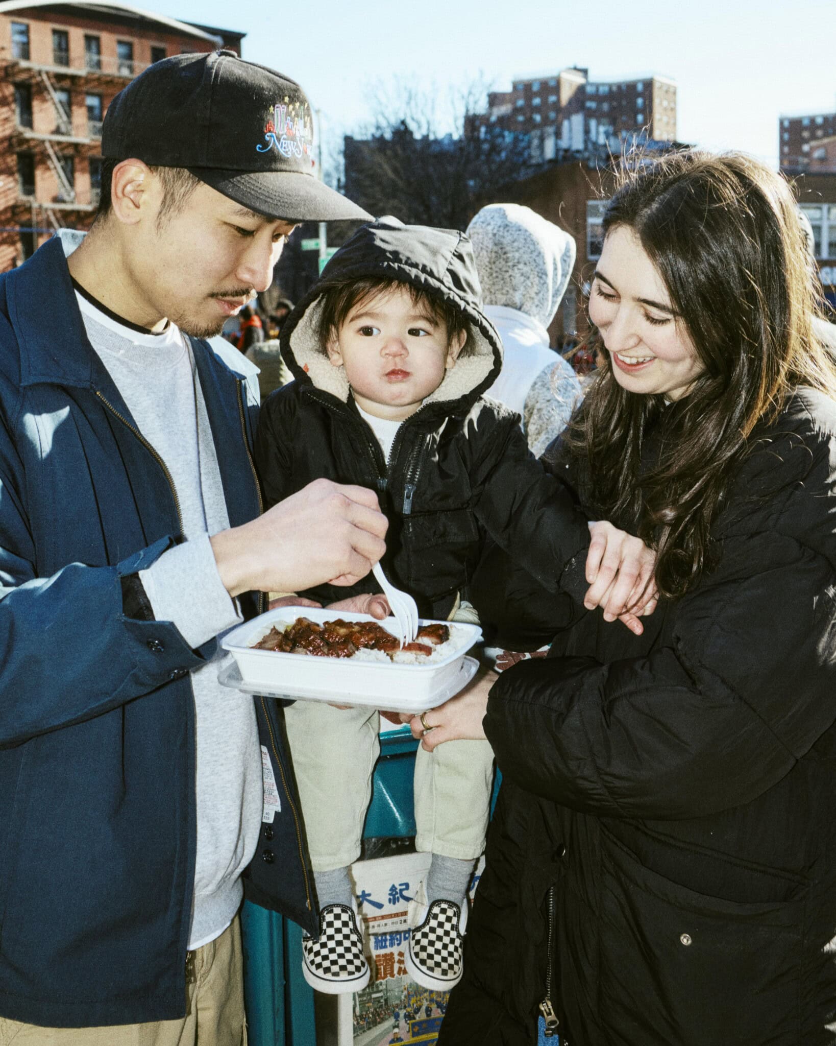 Chef Calvin Eng, his baby, and his wife Phoebe Melnick.