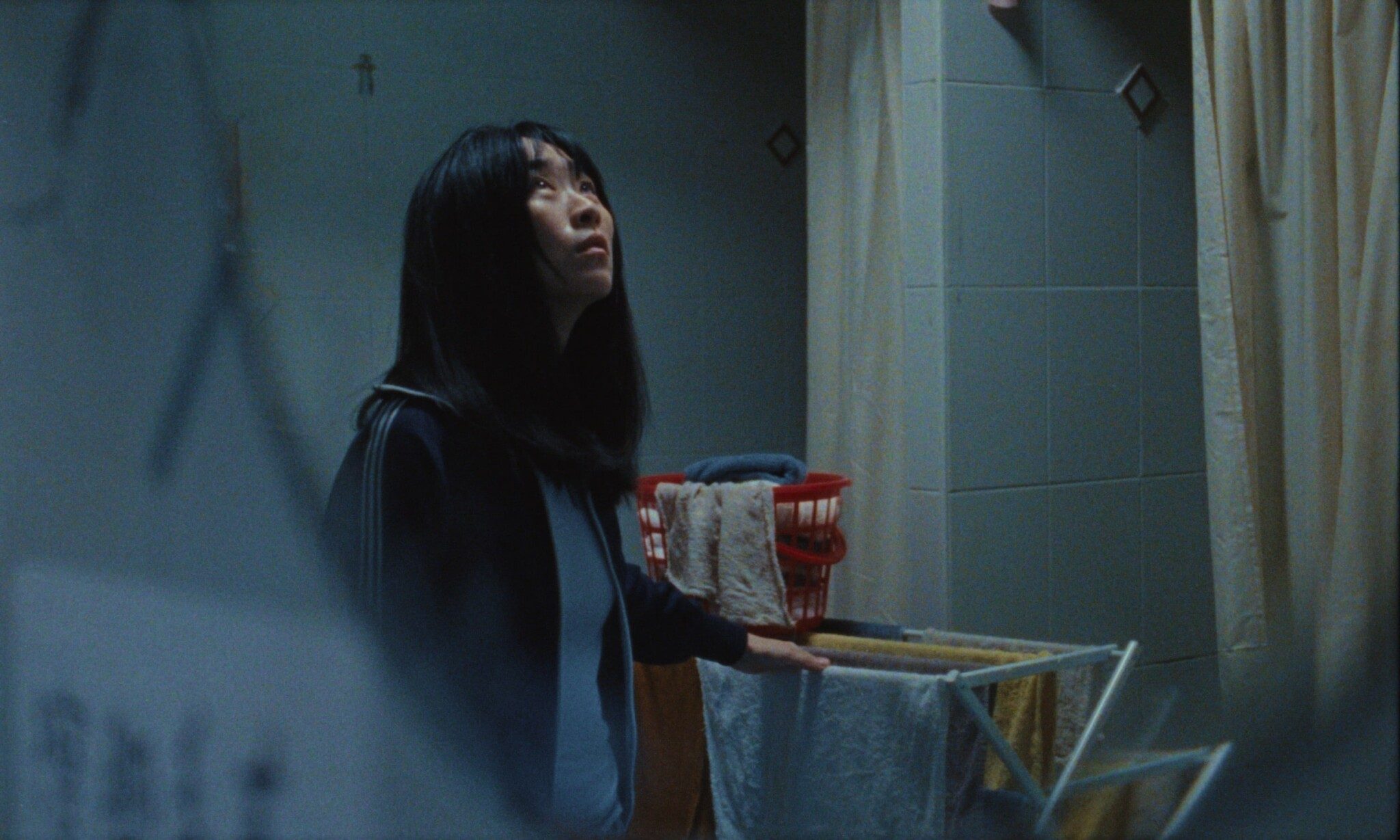 Still from "Blue Sun Palace"; Ke-Xi Wu as Amy.
