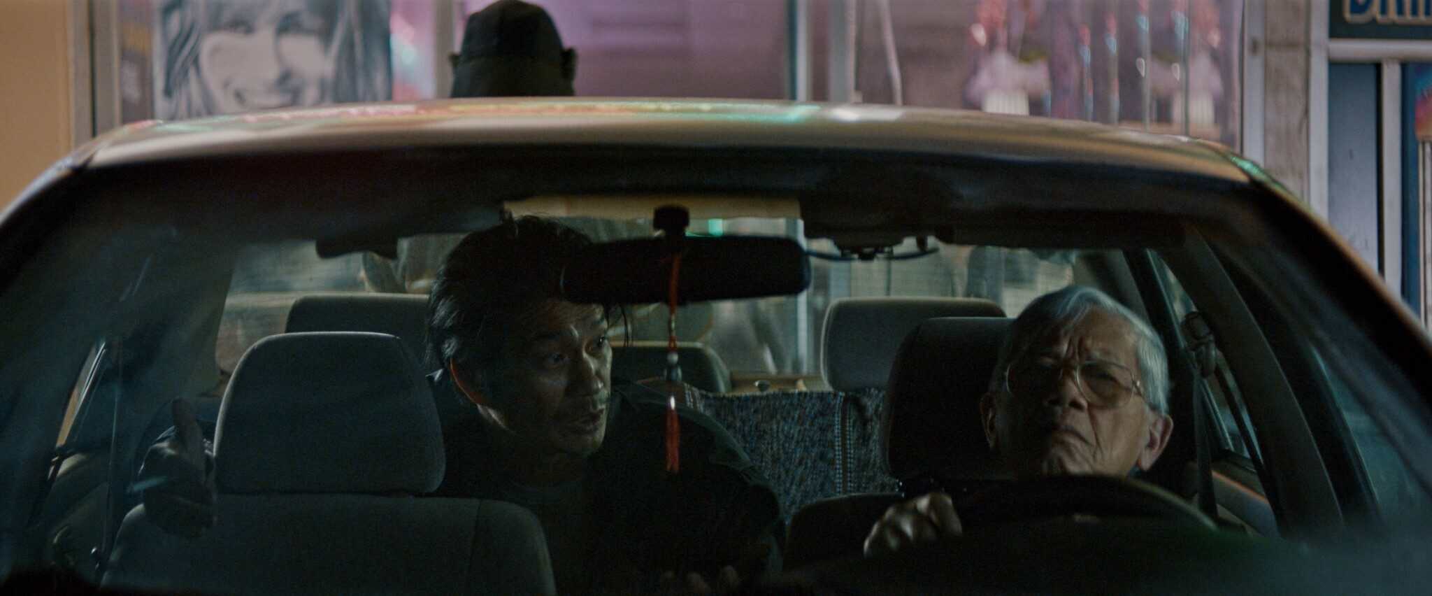 Dustin Nguyen as Tay and Hiep Tran Nghia as Long Ma in "The Accidental Getaway Driver."