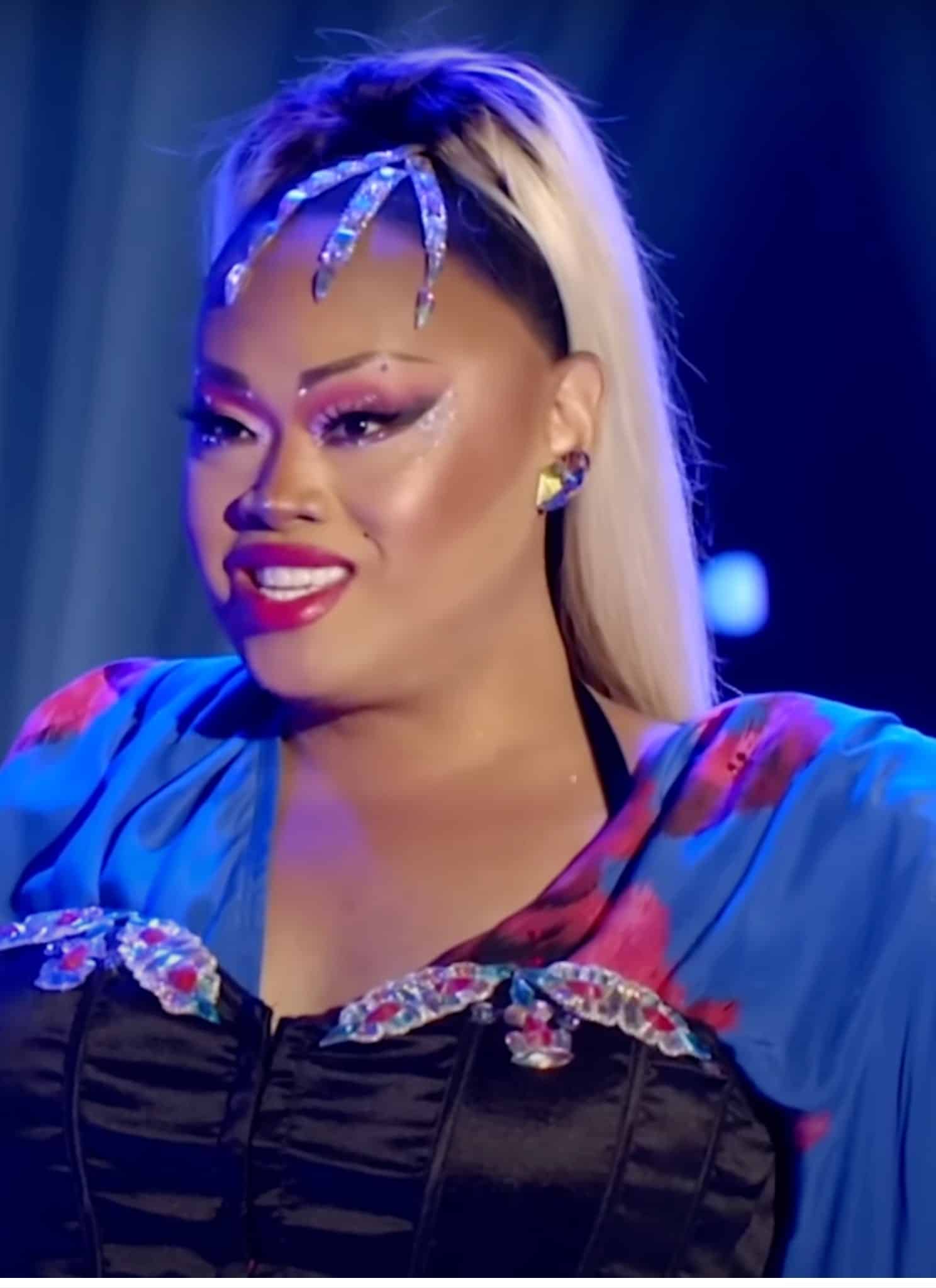 Jiggly Caliente in RuPaul's Drag Race in blue outfit.