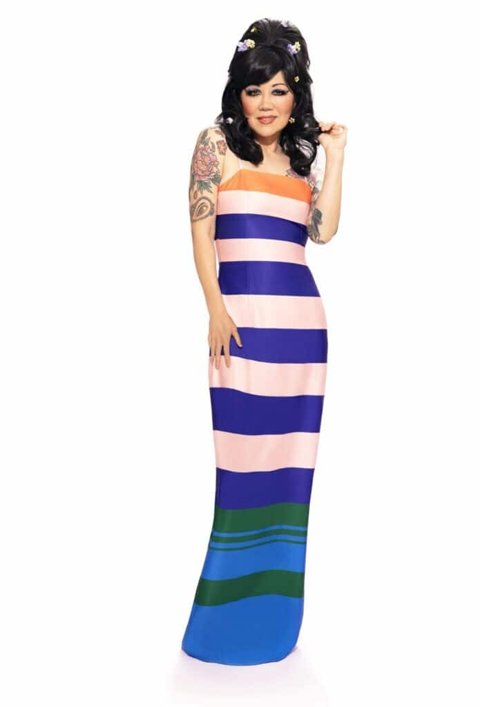 Margaret Cho in a floor-length striped dress.