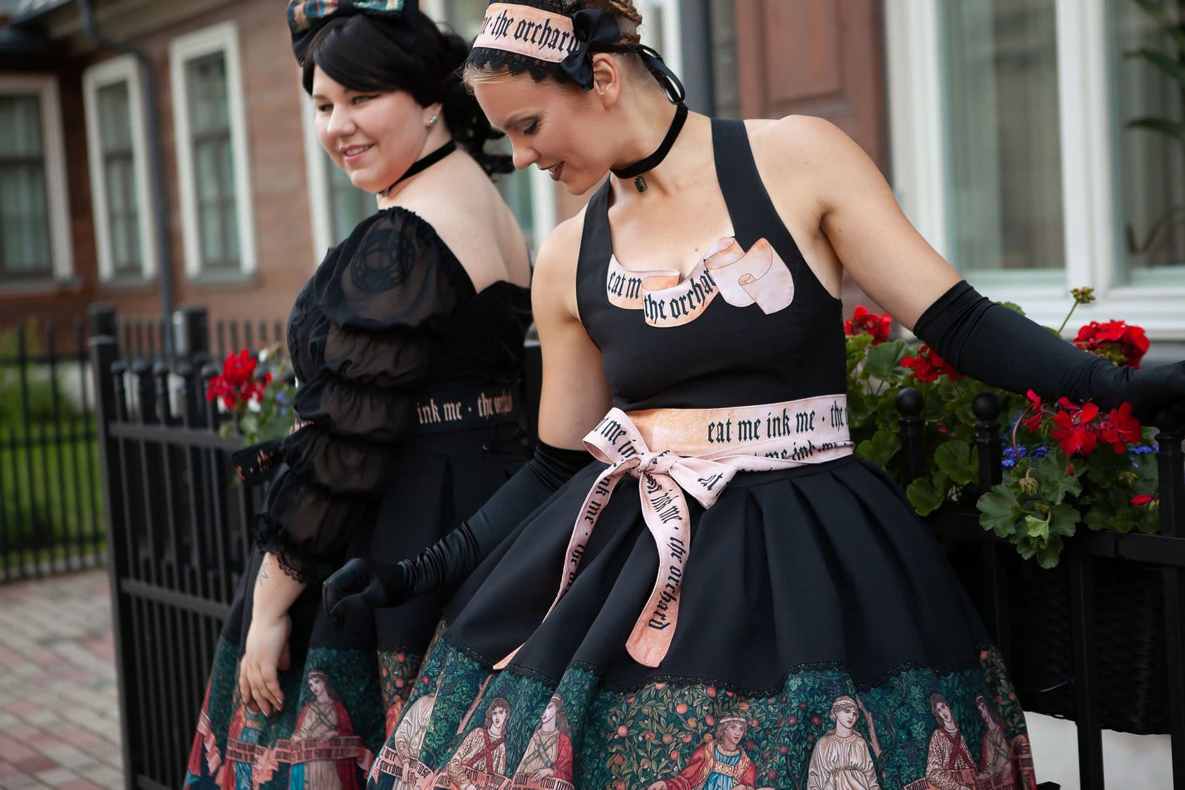 Models pose in outfits by Eat Me Ink Me.