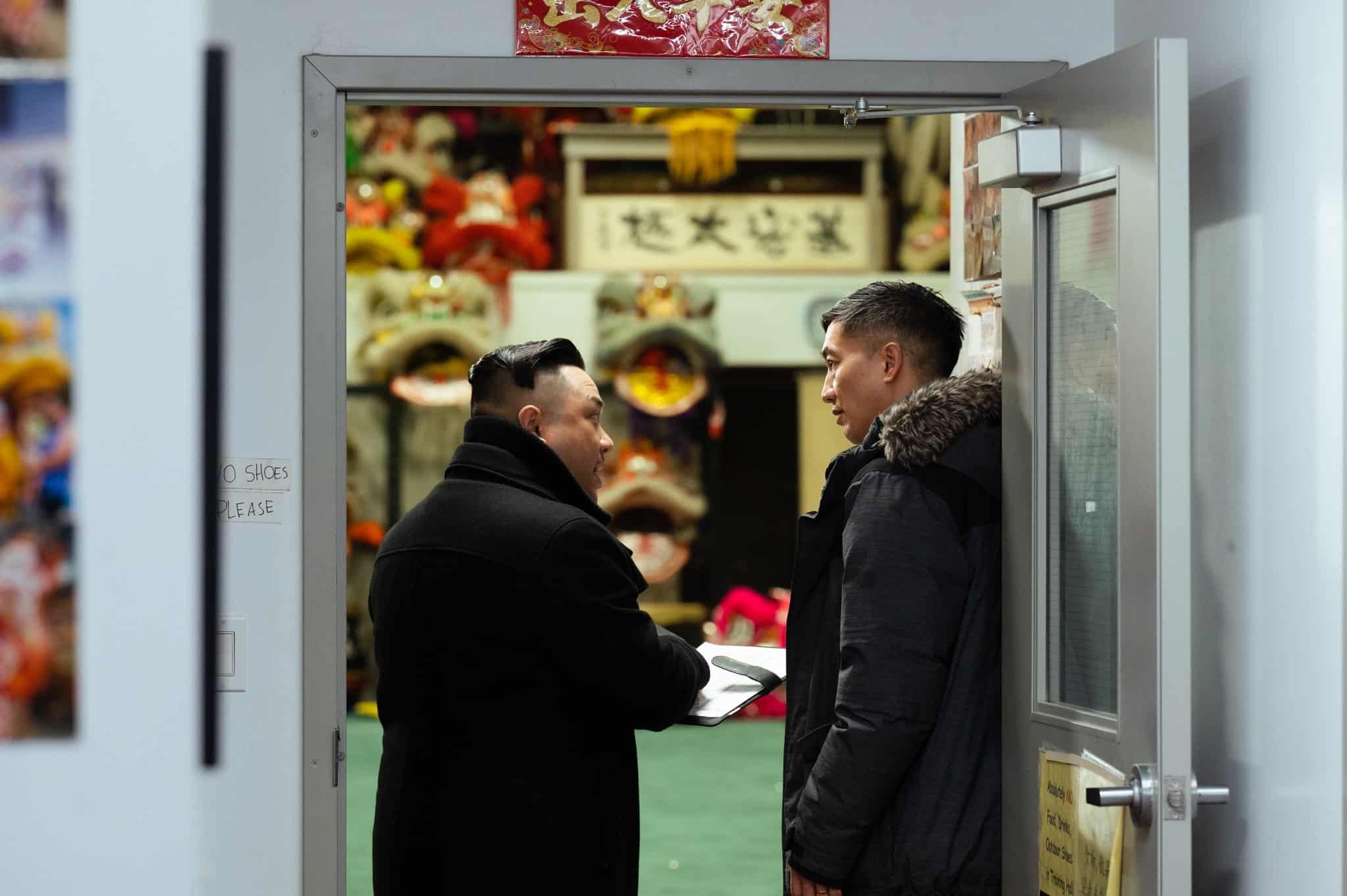 Two men stand in a doorway in "Lucky Star."