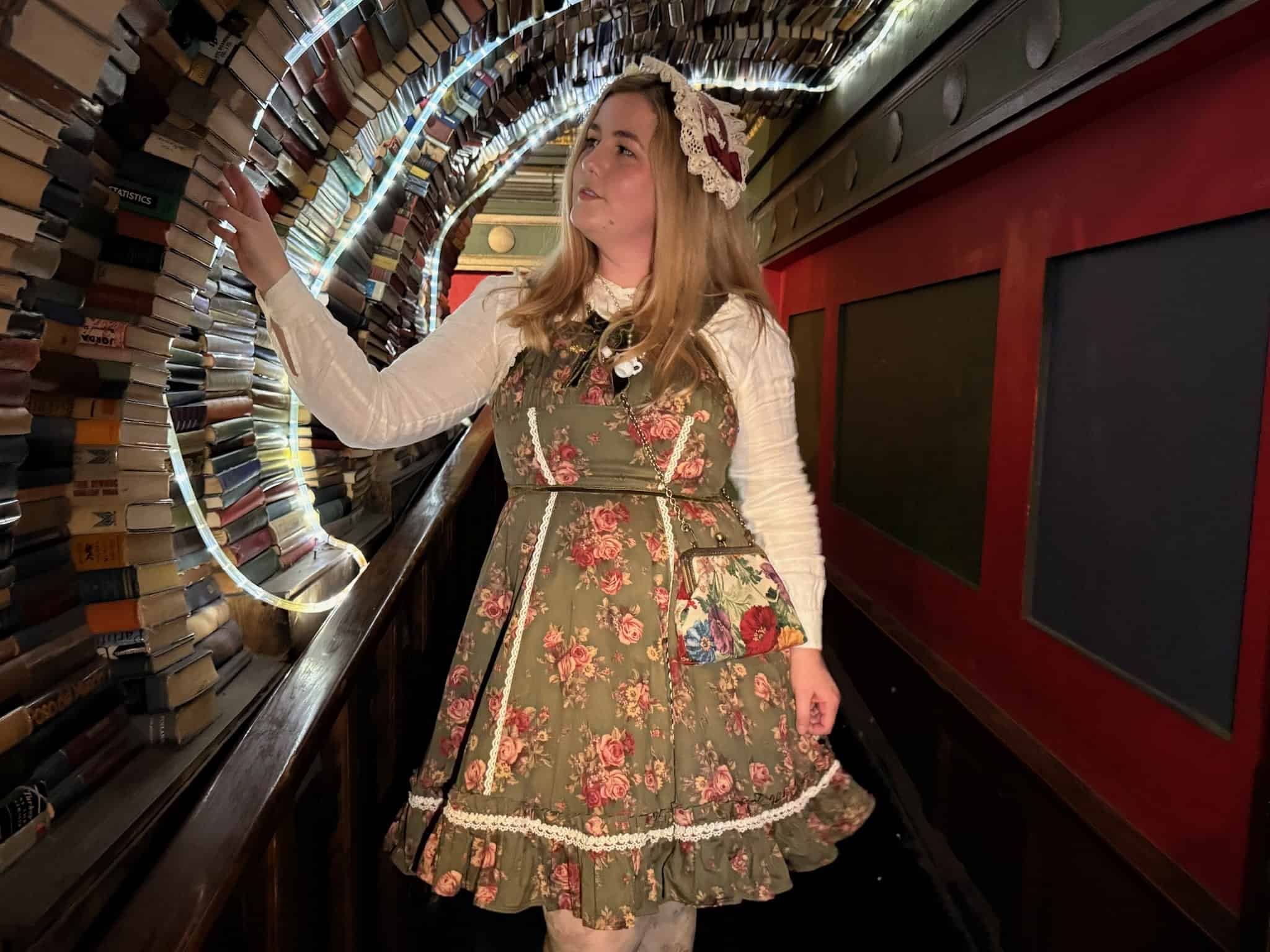 Jenna Shivley wears classic Lolita style in the Last Bookstore in Los Angeles.