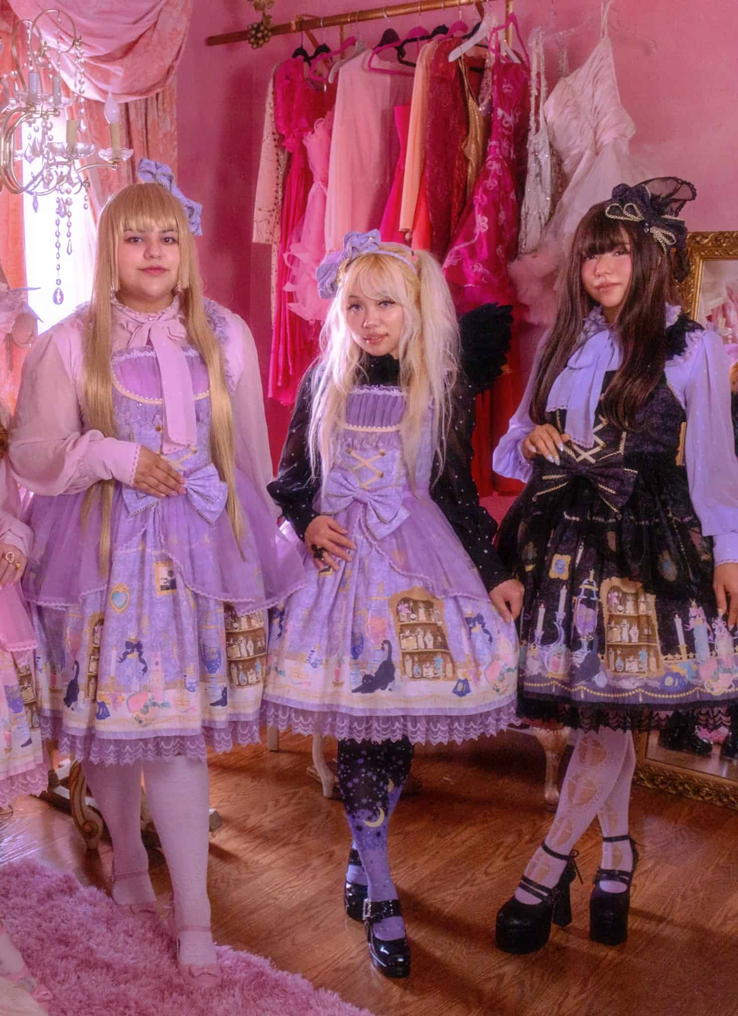 Models pose in Sleepyland dresses.