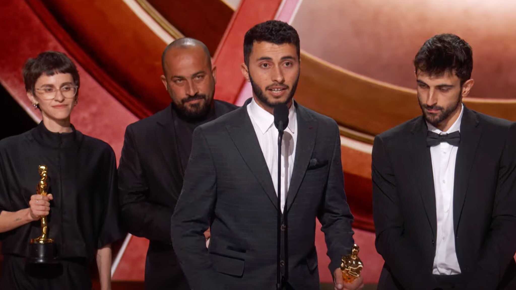 From left, Rachel Szor, Hamdan Ballal, Basel Adra, and Yuval Abraham onstage during the 97th Annual Oscars.