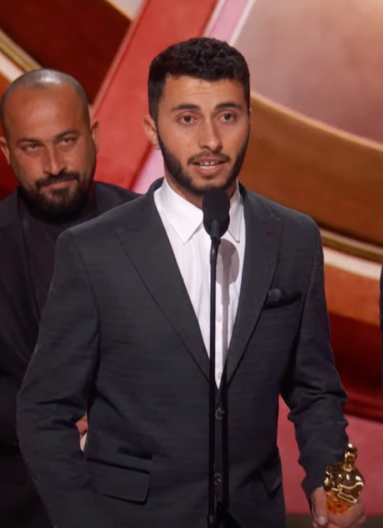 From left, Rachel Szor, Hamdan Ballal, Basel Adra, and Yuval Abraham onstage during the 97th Annual Oscars.