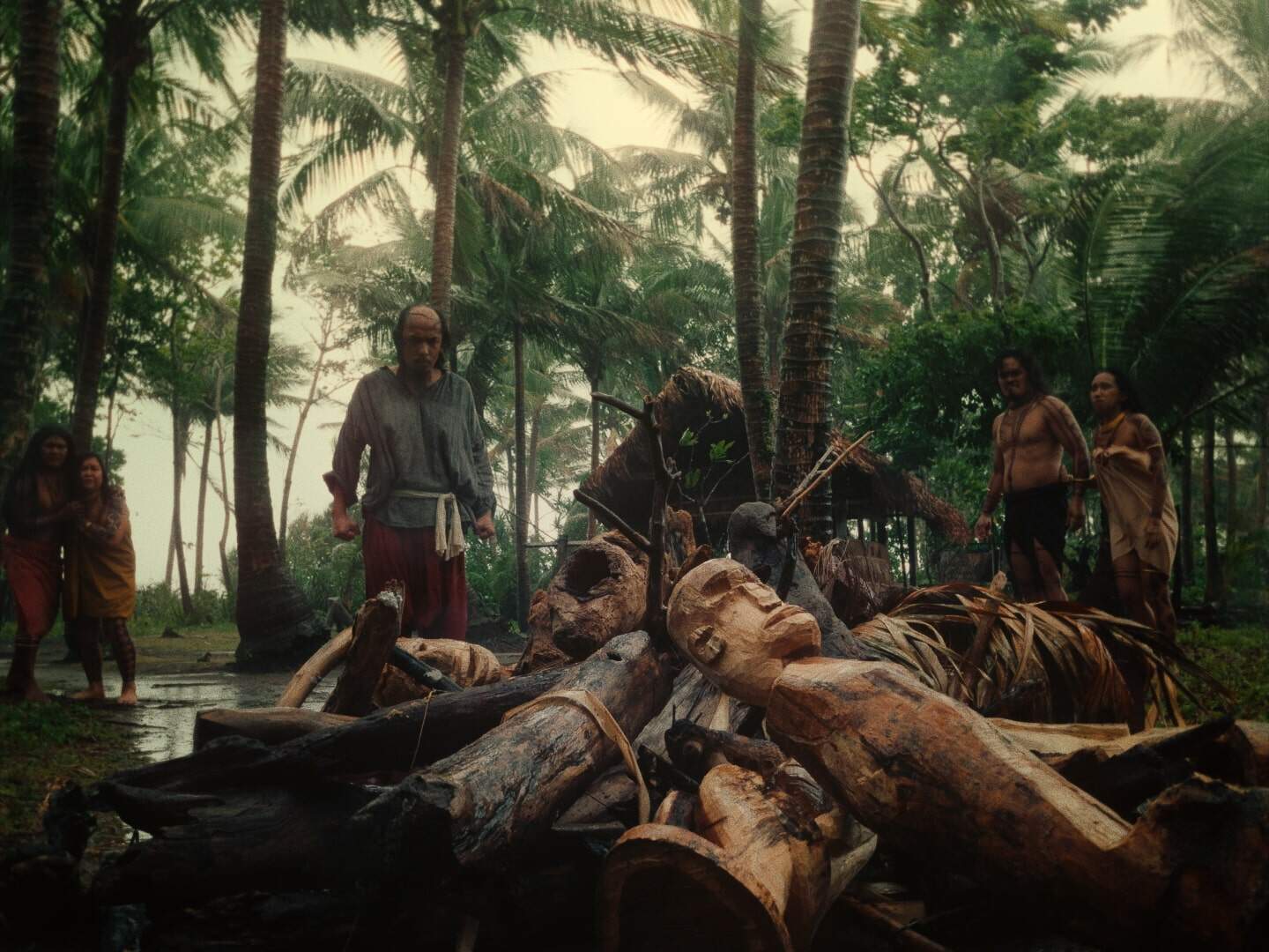 Still from "Magellan"; a native Southeast Asian tribe stands.
