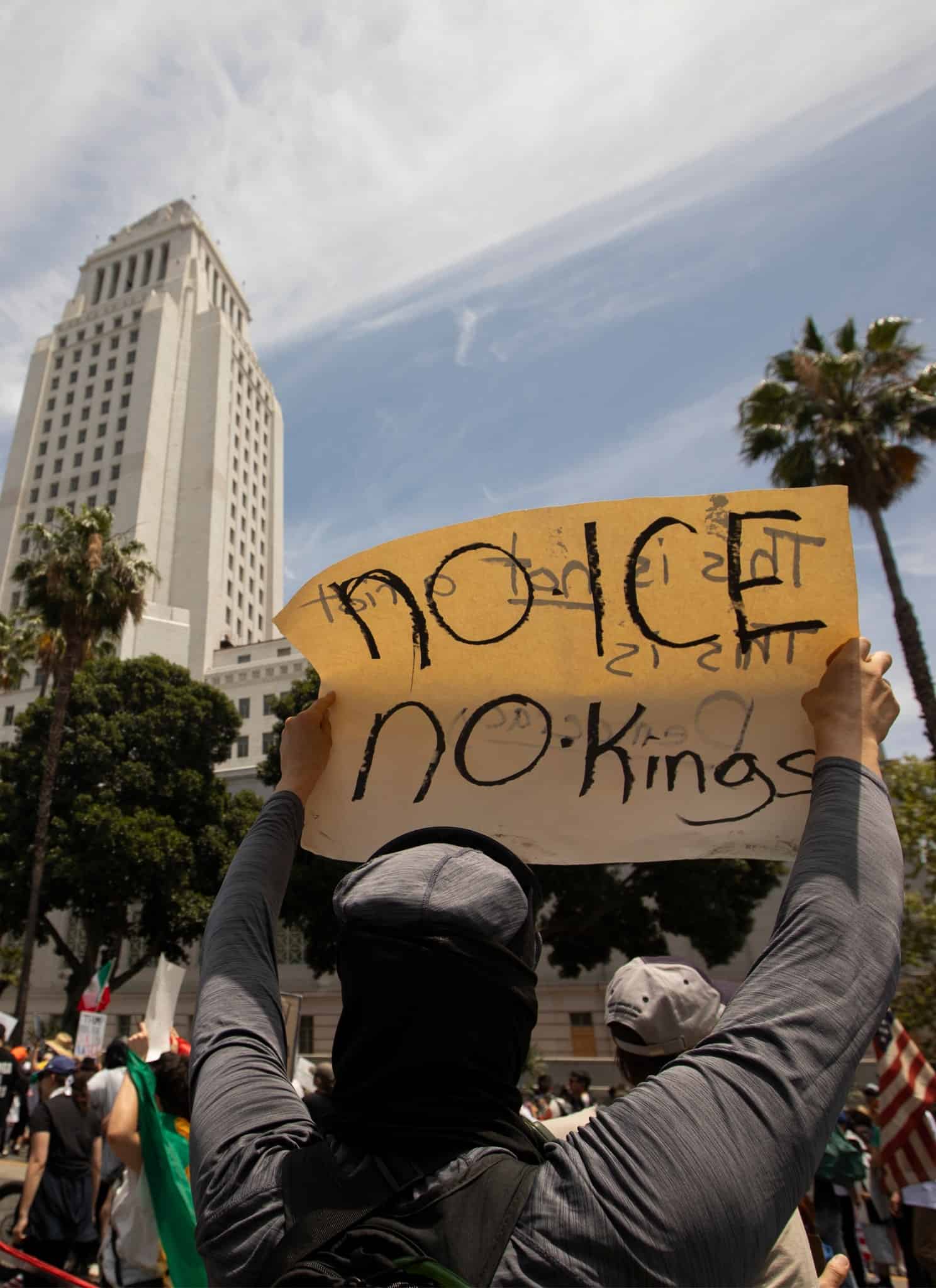 People rally to protest President Trump's actions during the No Kings nationwide movement.
