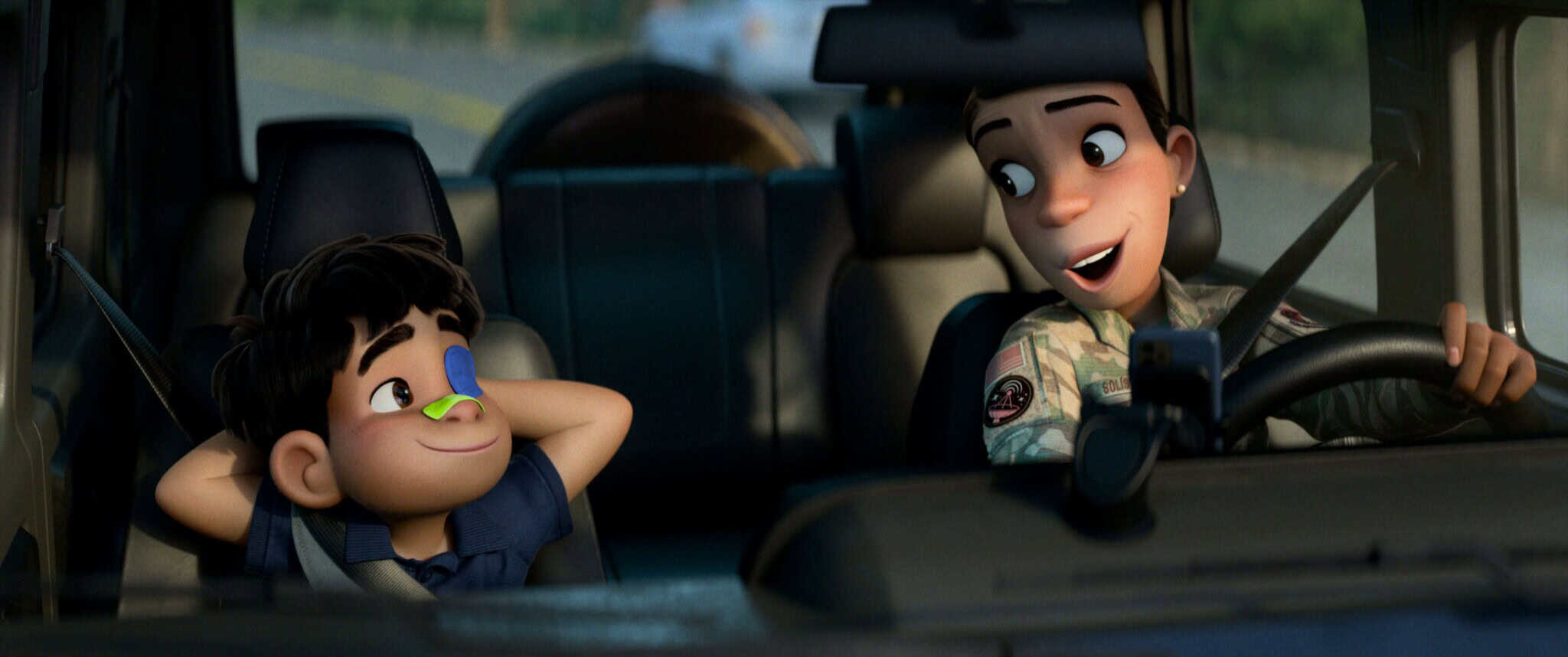 An animated boy and woman sit in a vehicle, smiling at each other.