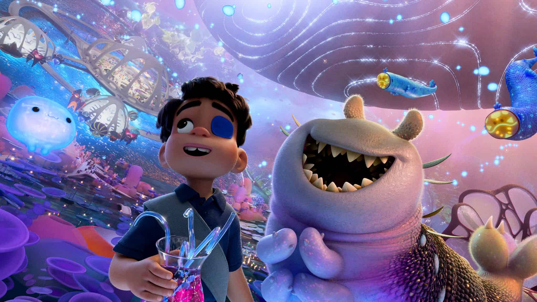 An animated boy with an eye patch over his left eye, holding a colorful drink, and a slug-like alien from "Elio."
