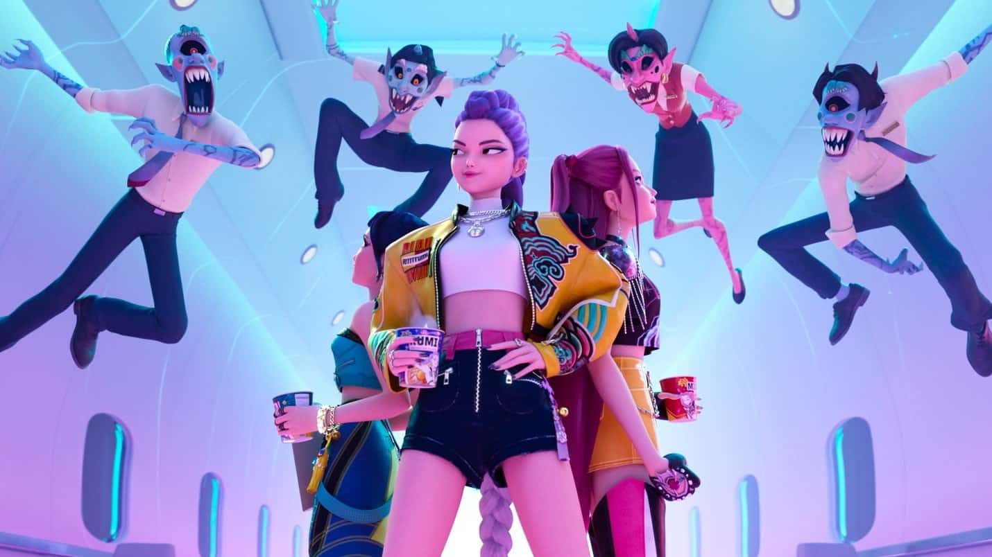 Three animated young woman stand together with demons surrounding them, against a light blue and pink background.