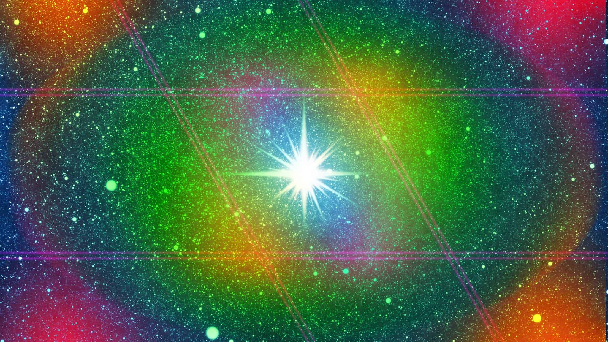 Starry sky with large, white starburst in the center surrounded by multicolor lights.