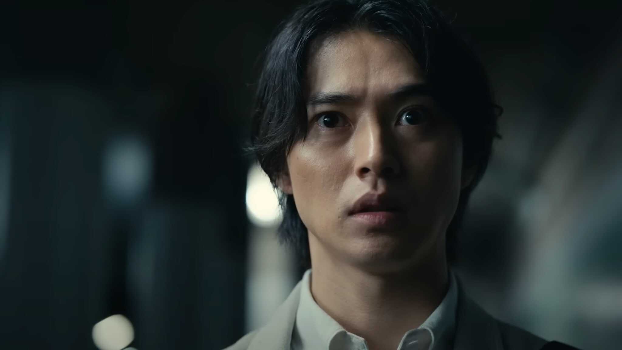 Kento Yamazaki as Ryohei Arisu wearing a suit.