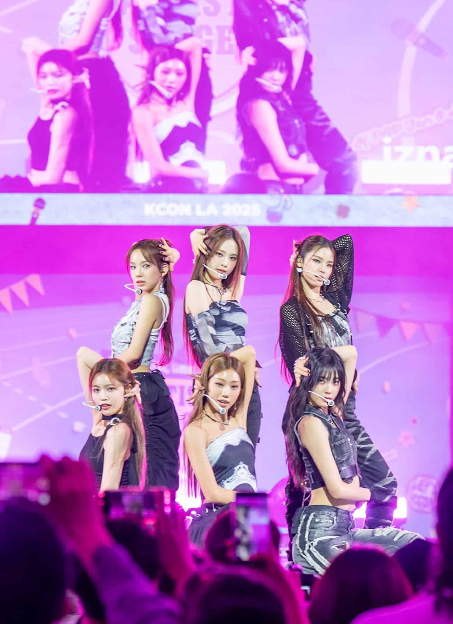 izna posing on stage at KCON LA 2025.
