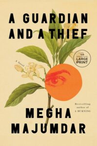 Book cover of A Guardian and a Thief by Megha Majumdar, one of today’s celebrated Asian authors, featuring a branch with green leaves and white flowers, an orange fruit, bold black text on pale yellow, and a Large Print sticker.