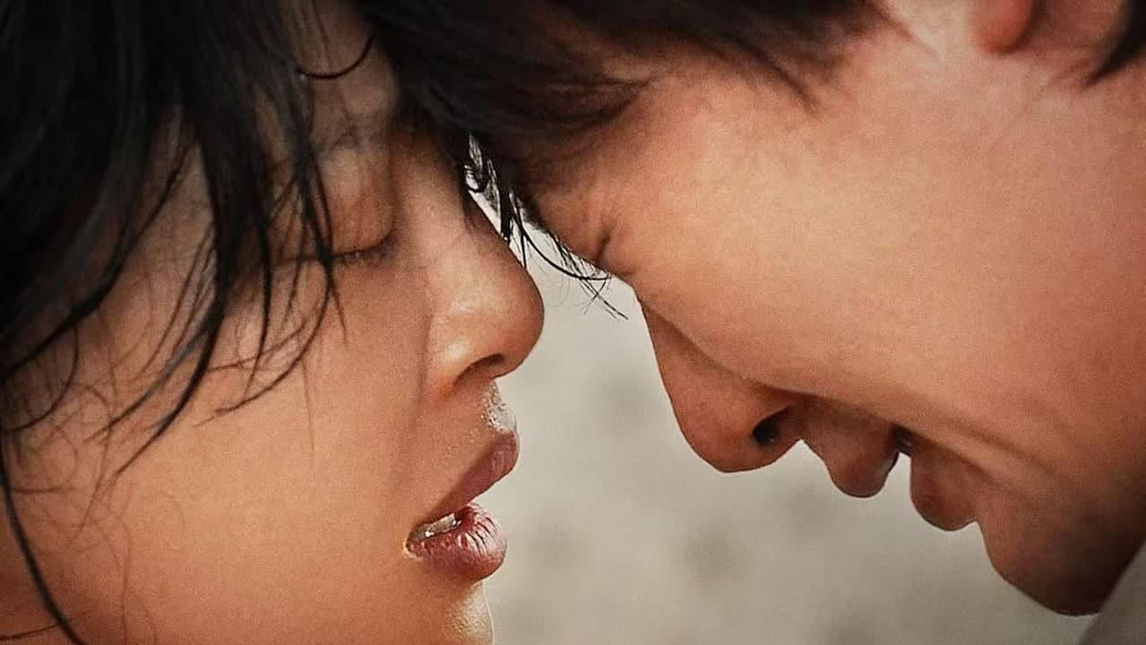 Two people with their faces very close, eyes closed and foreheads touching, appear emotional and distressed, possibly crying or about to cry.