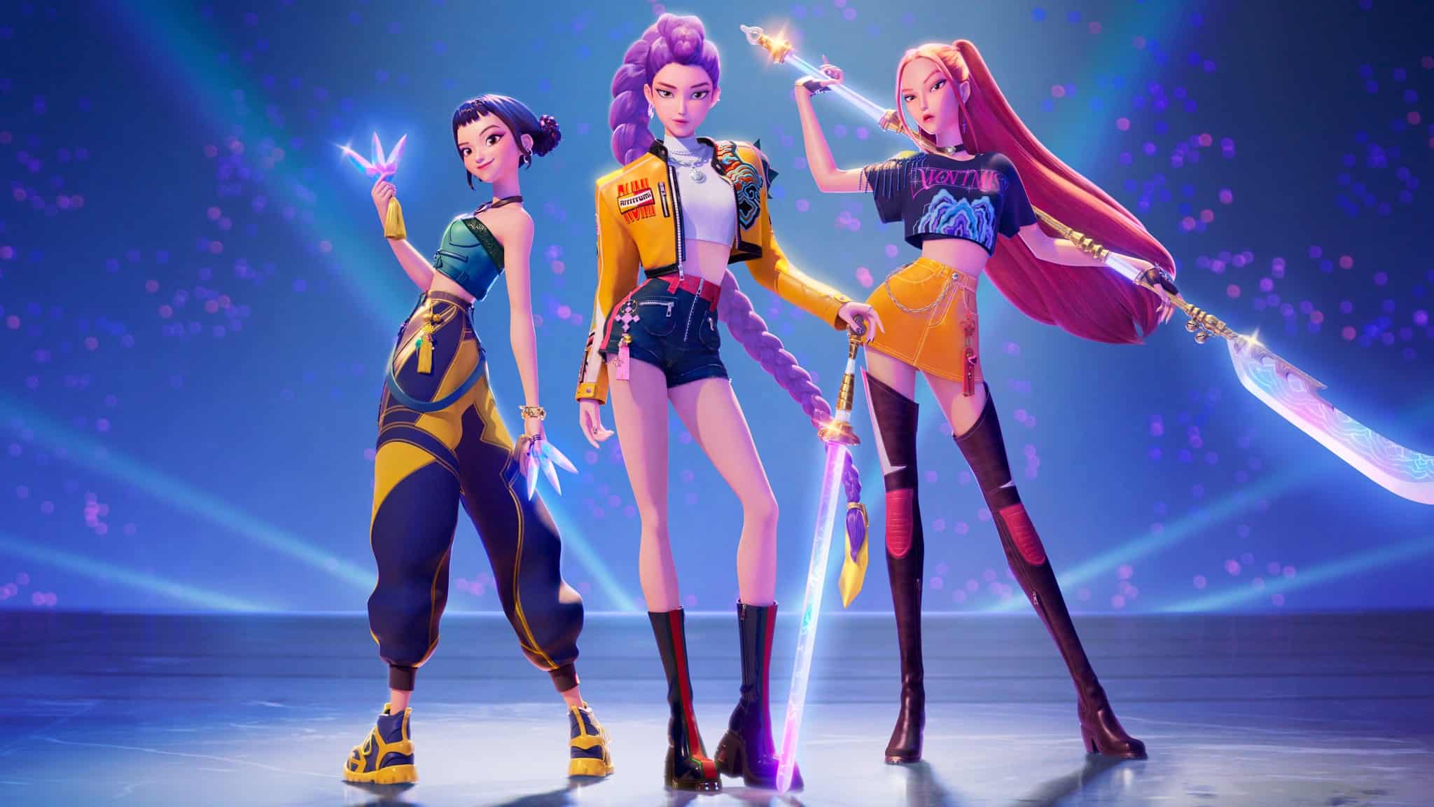 Three animated female characters stand confidently on a lit stage with glowing weapons. They wear stylish, futuristic outfits in yellow, blue, black, and orange tones, with a sparkling purple background and spotlight effects.