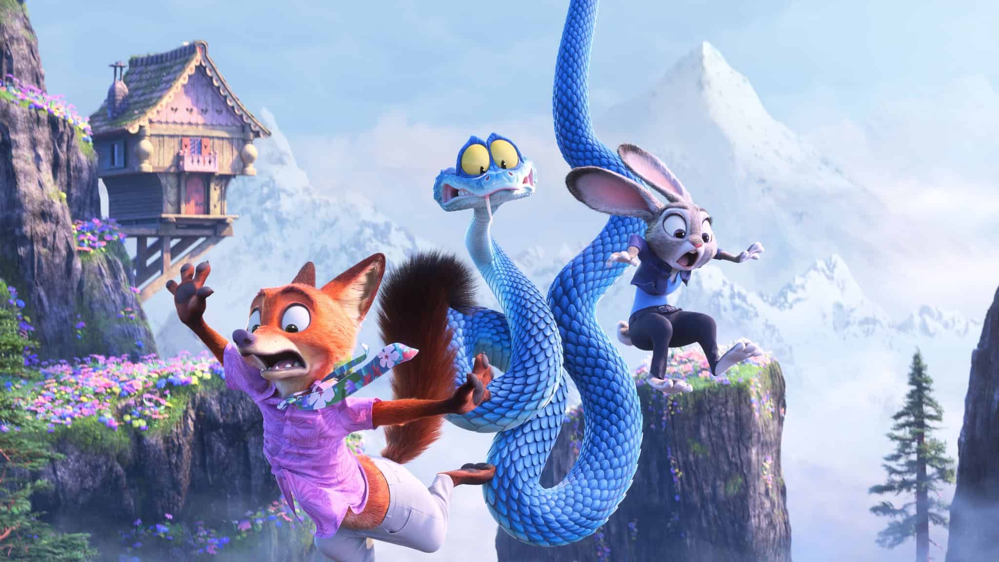 A scared fox, a blue snake, and a surprised rabbit are leaping across a cliff gap with snowy mountains and a small wooden house in the background. Wildflowers cover the cliffs under a bright sky.