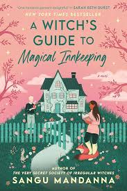 Illustrated book cover of A Witchs Guide to Magical Innkeeping by Sangu Mandanna, showing a cozy house, pink trees, a woman holding a cat, and a man in a suit, with magical, whimsical elements throughout.
