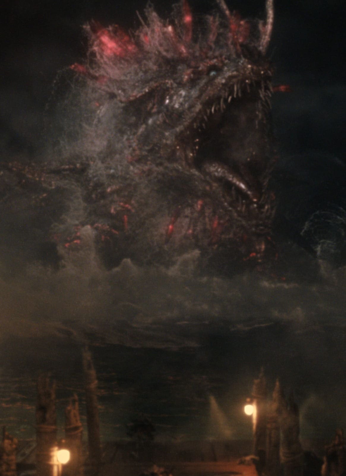 Two people stand on a pier at night, gazing toward a giant, glowing sea monster—much like a creature from Monarch: Legacy of Monsters—emerging from stormy waters, its mouth open wide and red light emanating from its body.
