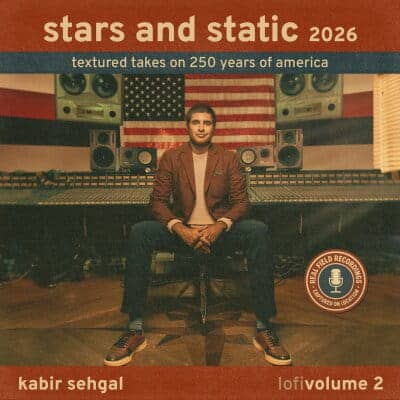 A man in a brown suit sits in a recording studio with an American flag behind him. The text reads: stars and static 2026 – textured takes on 250 years of America, kabir sehgal, lofi volume 2.