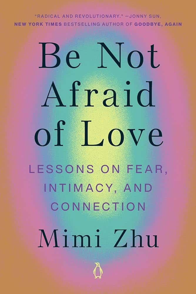Book cover of Be Not Afraid of Love by Mimi Zhu, featuring bold black text on a gradient background of pink, purple, green, and yellow, with the Penguin logo at the bottom.
