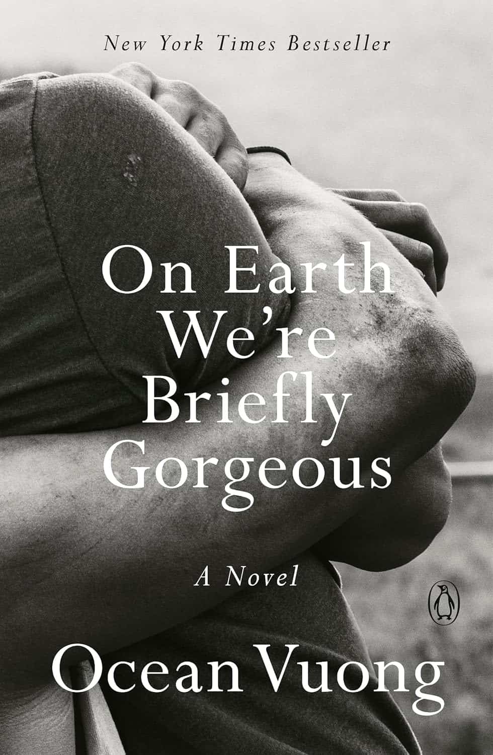 Black and white book cover showing a close-up of two people embracing. The title reads “On Earth We’re Briefly Gorgeous: A Novel” by Ocean Vuong. New York Times Bestseller appears at the top.