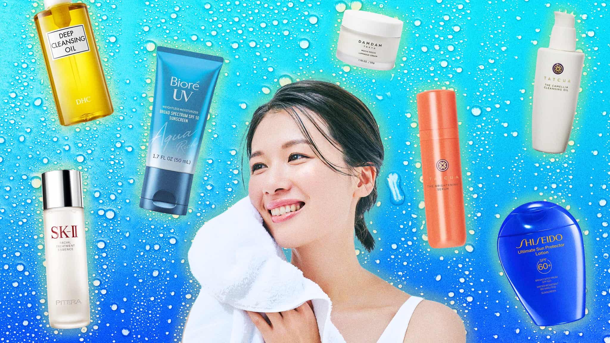 A smiling woman holds a towel to her face, surrounded by various skincare products on a blue, water-droplet background.