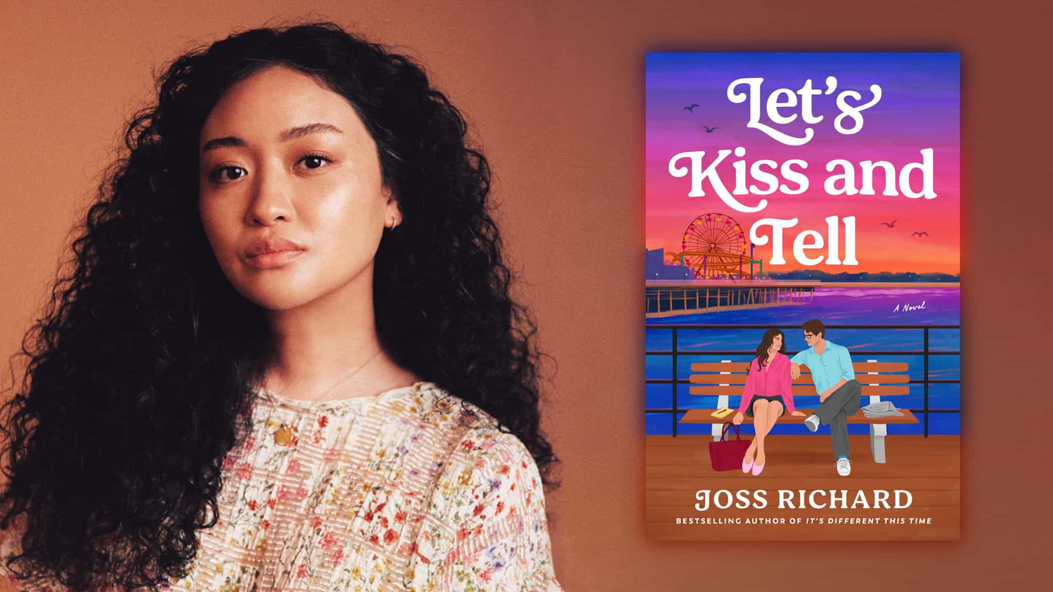 A woman with long curly hair stands next to a brightly colored book cover titled Lets Kiss and Tell by Joss Richard, showing a couple sitting on a bench by a pier at sunset.