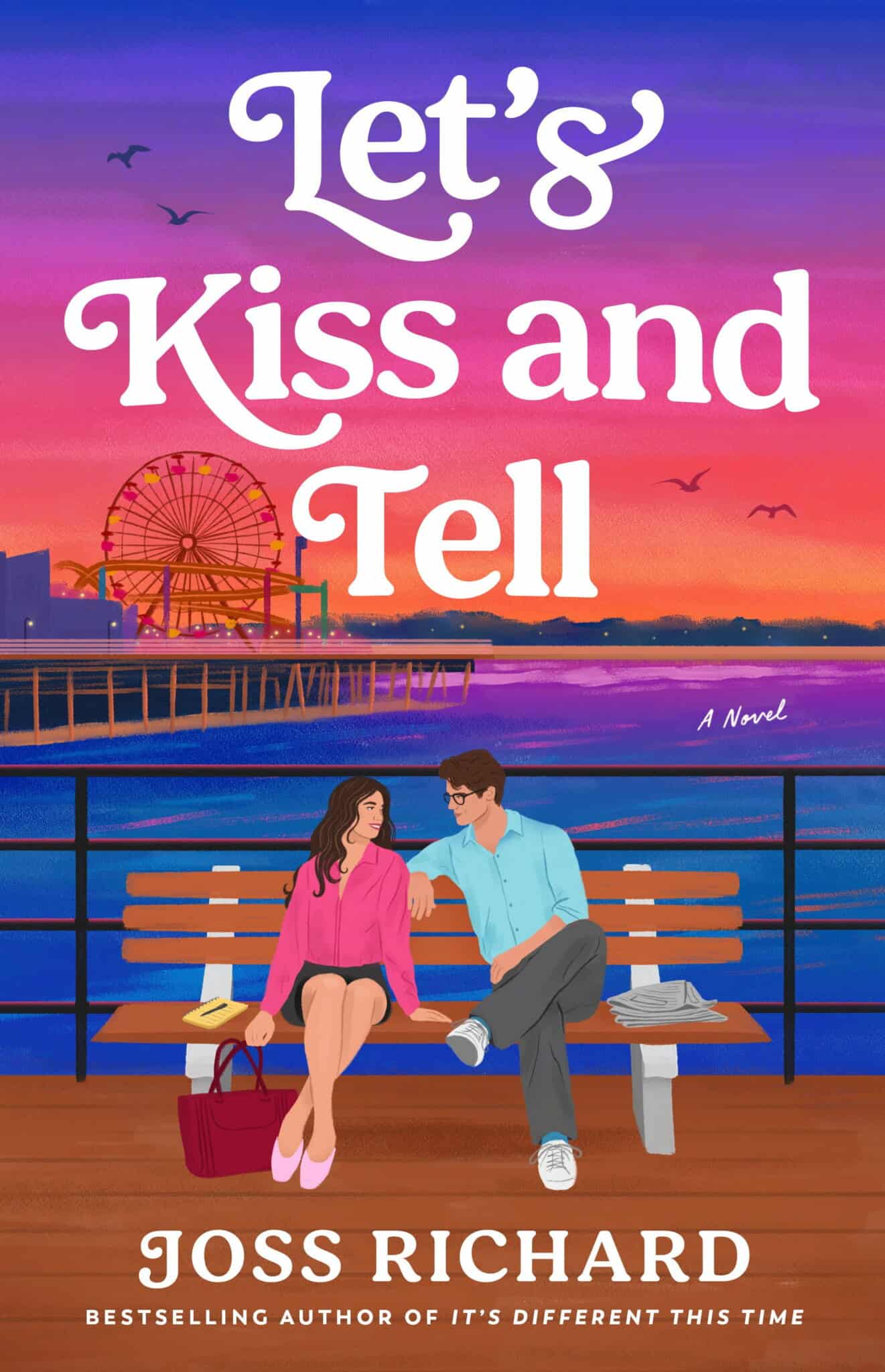 Illustration of a couple sitting on a pier at sunset, smiling and holding hands. The title Lets Kiss and Tell appears above them. The sky is colorful with birds flying, and a city skyline is in the background.