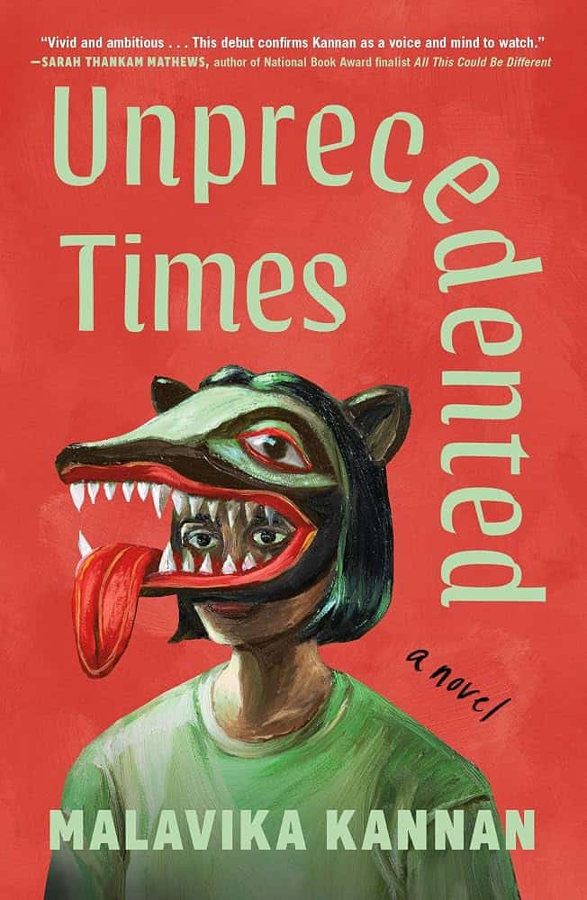 Book cover for Unprecedented Times by Malavika Kannan, featuring a person wearing a wolf mask on a red background. The title text is large and unevenly placed around the figure.