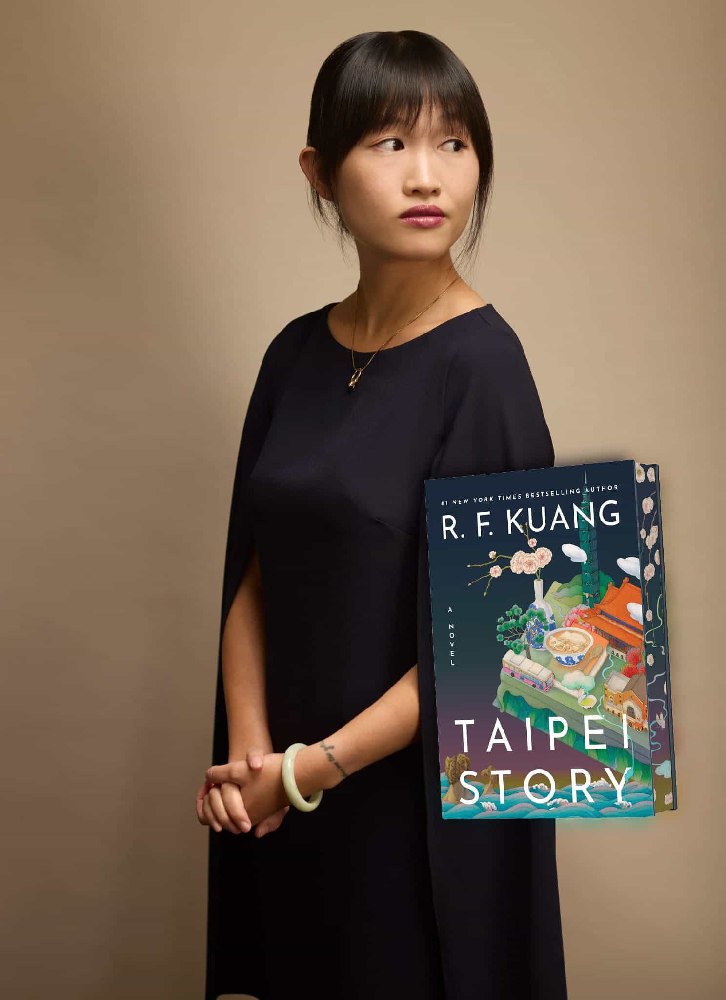 A woman with dark hair looks to the side next to the cover of the book Taipei Story by R.F. Kuang, which features colorful illustrations of a cityscape and flowers.