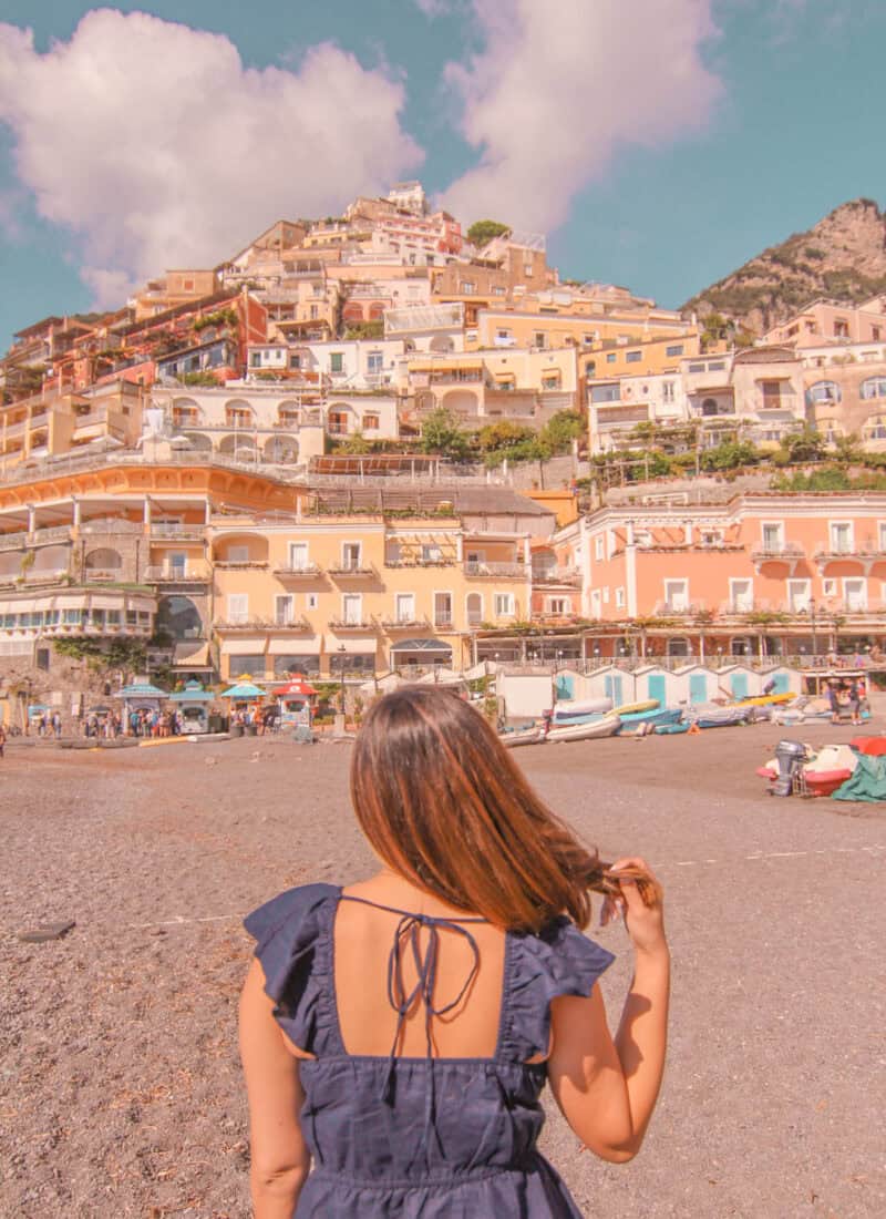 girl standing in front of Positano Beach