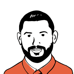 man with orange shirt black hair and black beard