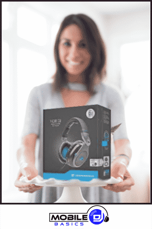 A woman holds a box containing Sennheiser HD 25 Lite headphones on a white plate—an ideal pick for Gift Ideas for DJs. The Mobile DJ Basics logo is at the bottom of the image.