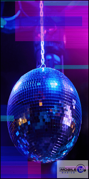 a shiny disco ball hanging from a chain.