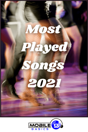 People dancing on a purple-lit floor with the text "Most Played School Dance Songs 2021" and a Mobile DJ logo at the bottom.
