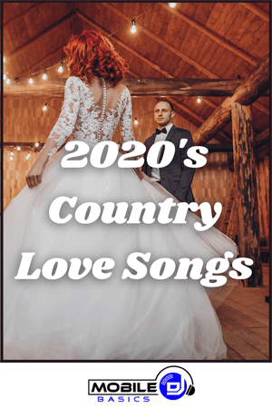 Bride in a white dress with red hair stands in front of groom in suit under string lights, with text reading "2020's Love Songs." Mobile DJ Basics logo at bottom.