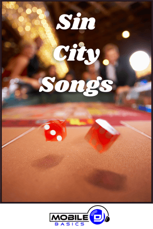Two red dice roll on a casino gaming table with blurred people and lights in the background; text reads "Sin City Songs: Songs About Las Vegas.