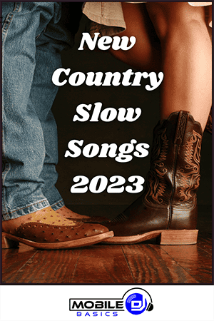 Close-up of a man’s and woman’s boots facing each other with text “New Country Slow Songs 2023” overlaid, perfect for school dance songs, with the Mobile Basics logo at the bottom.
