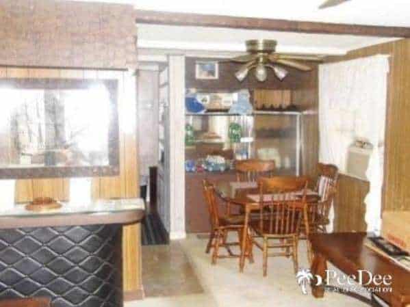 Fleetwood Broadmore Single Wide - Original Living Room and Dining Room Design Example 3 - Original unpainted paneling - Favorite Classic Mobile Home Models of Mobile Home Experts