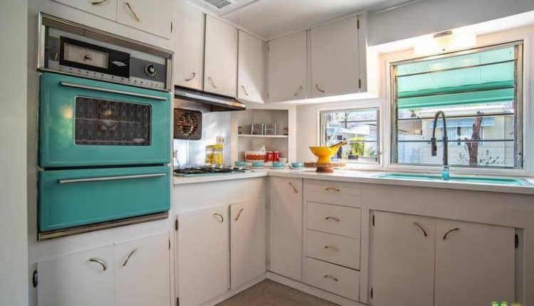 1962 Skyline is a Vintage Mobile Home Beauty - Teal Oven in White Kitchen