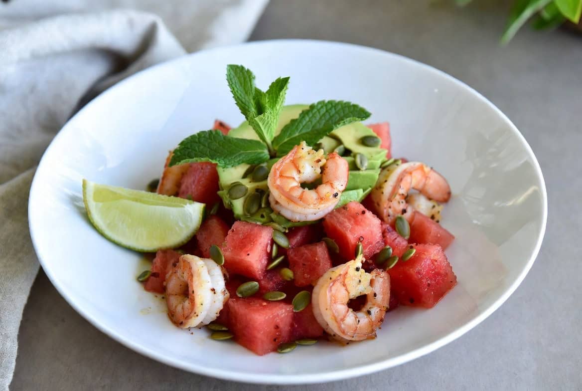 Shrimp watermelon salad with avocado, mint, and chile-lime pepitas