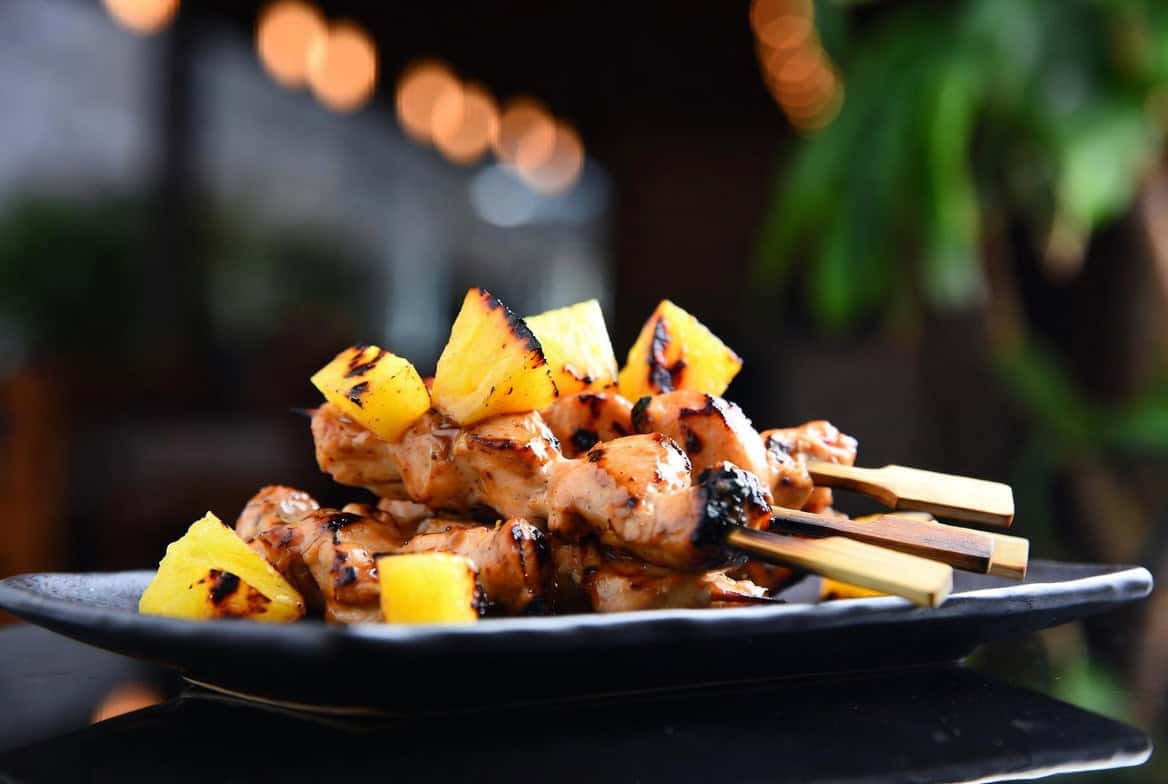 Tamarind-chile chicken skewers with grilled pineapple