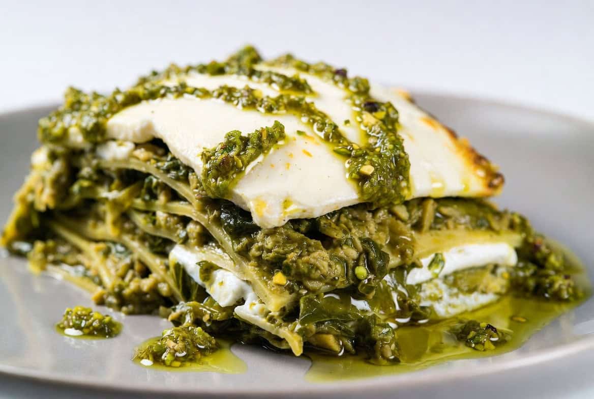 Spring vegetable lasagna with pea pistachio pesto
