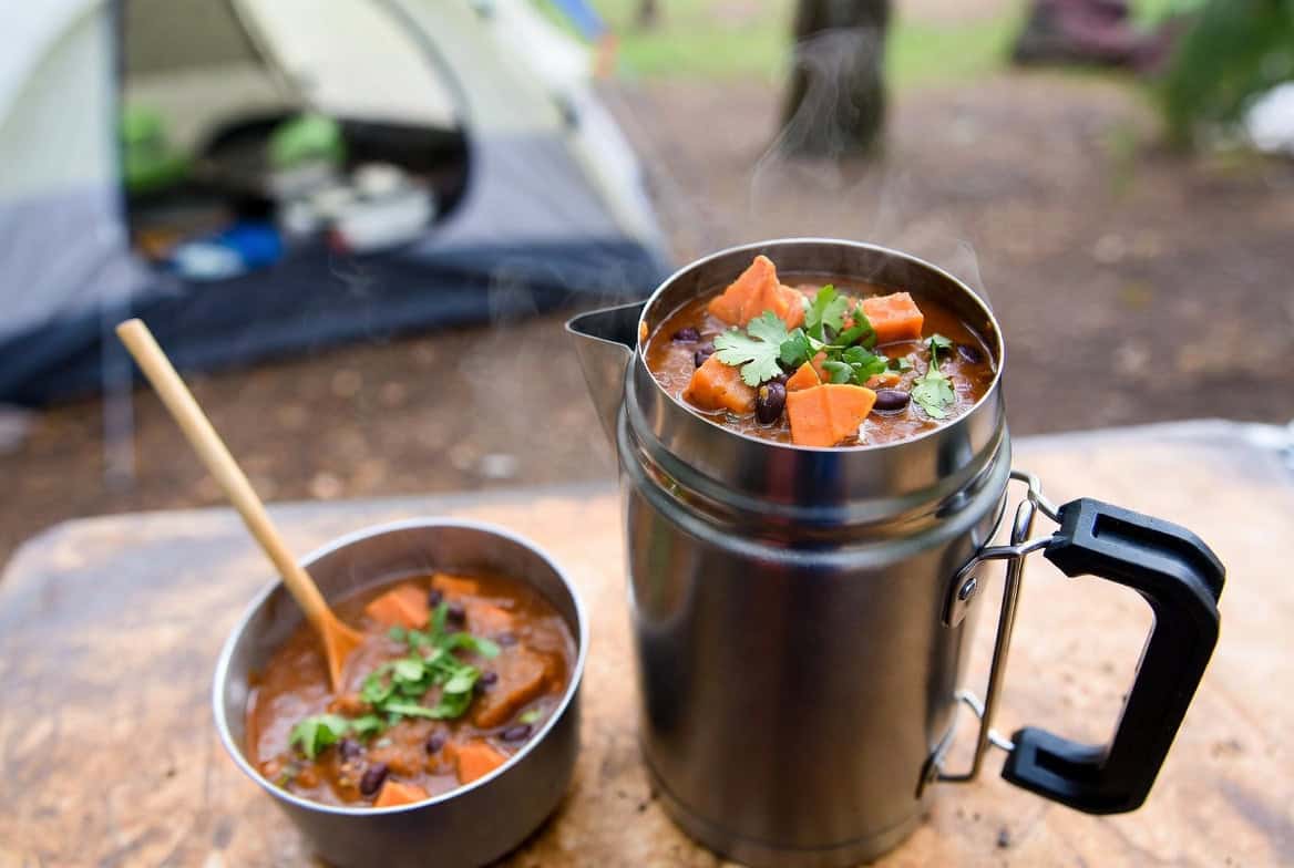 Sweet potato black bean chili in camping thermos with cilantro