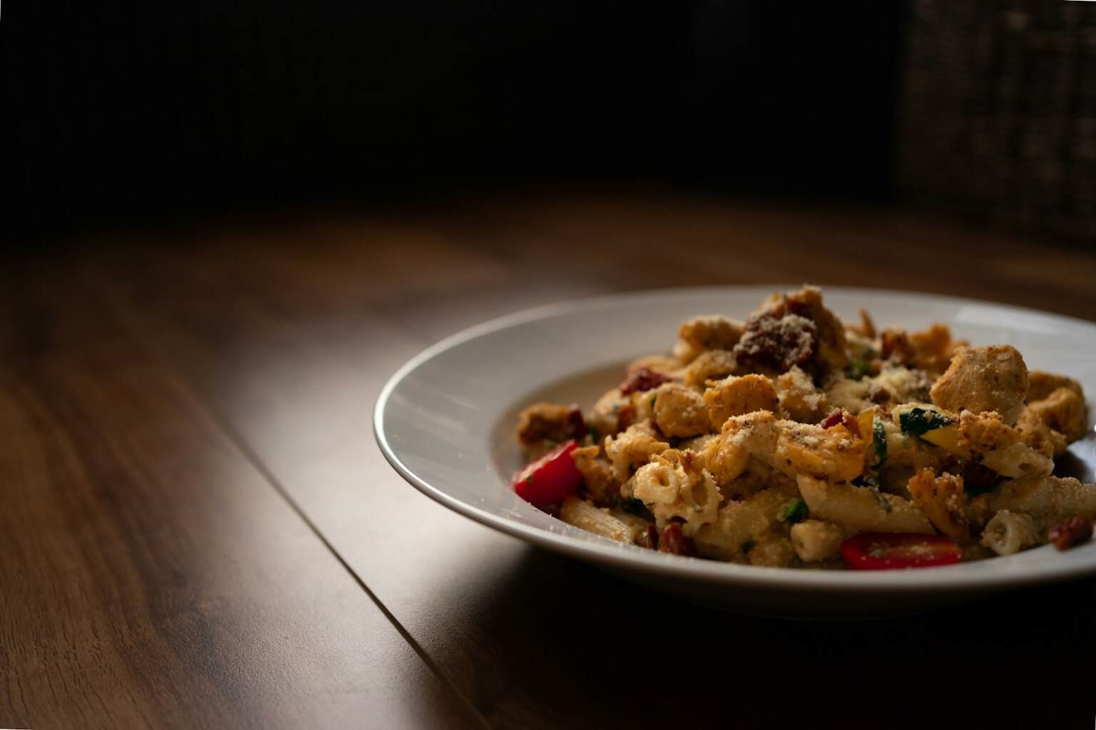 Roasted vegetable and chickpea salad on a white plate
