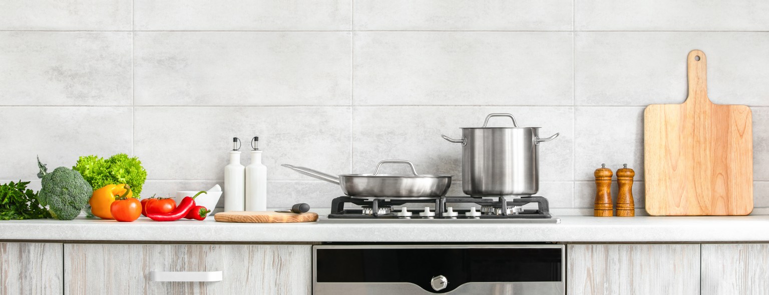 Modern kitchen countertop with culinary utensils for home service capacity